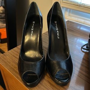 Michael black leather stilettos size 7. Never worn.
